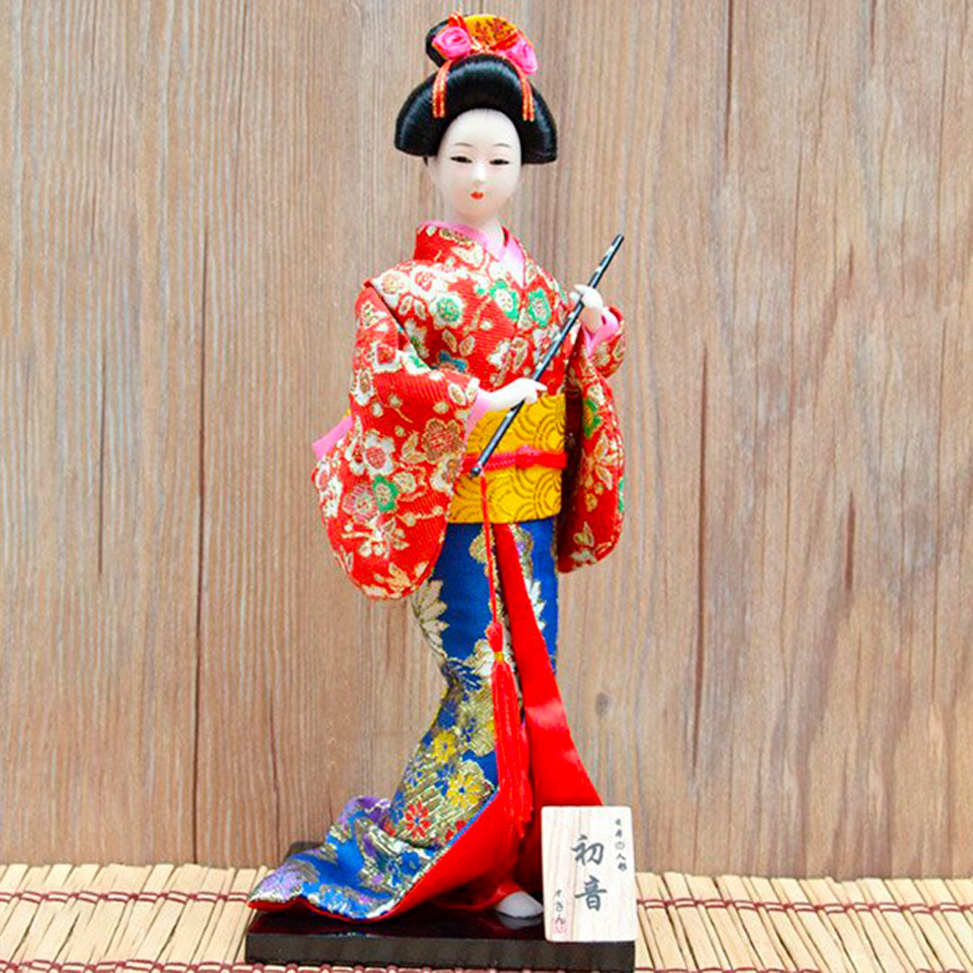 Figurine de Geisha avec Parasol Rouge