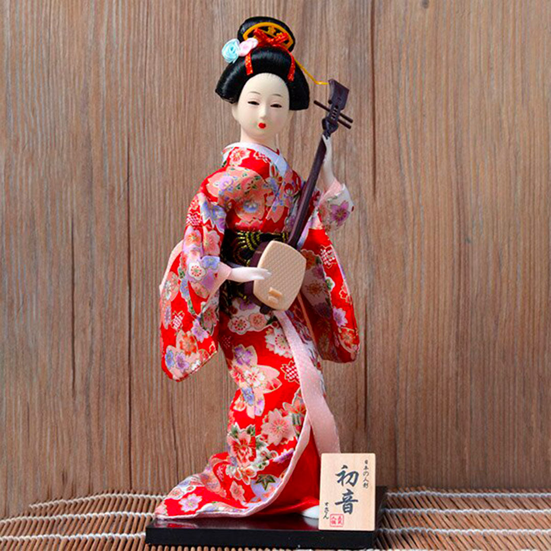 Figurine de Geisha avec Shamisen et Kimono Rouge